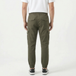 Men's slim fit cotton cargo trousers by FJØRNA, shown in a neutral color with multiple cargo pockets and a tapered leg fit.