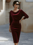 FJØRNA velvet boat-neck pencil dress for women, showcasing a draped design and sleek silhouette in rich velvet fabric.