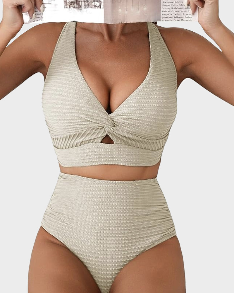 FJØRNA women's bikini set with a flattering fit, featuring a stylish top and matching bottoms for swimwear fashion.