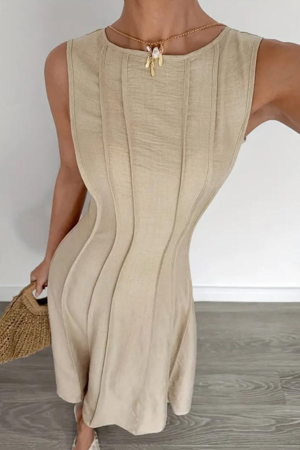 Elegant FJØRNA sleeveless maxi dress with solid color, round neck, pleated design, perfect for casual or wedding occasions.