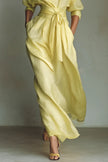 FJØRNA solid color lapel long sleeve casual maxi dress with pockets and waist-cinching design, perfect for everyday wear.
