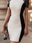 FJØRNA sculpted contrast panel short sleeve evening dress for women, showcasing fitted design and elegant style.