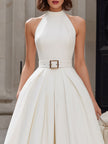 Ivory FJØRNA halter neck pleated midi dress for women, white dress with elegant pleats and a stylish halter neckline.