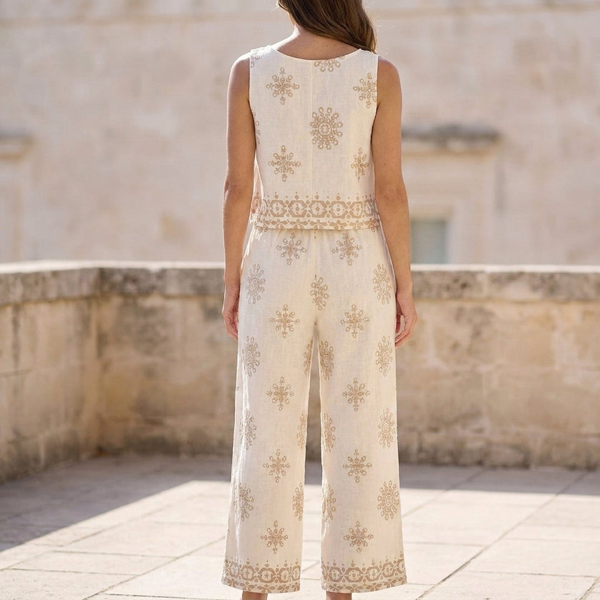 FJØRNA women's elegant two-piece geometric drawstring co-ord set shown from the back, featuring stylish matching top and pants.
