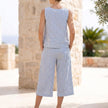 FJØRNA women's summer two-piece striped co-ord set with pockets, shown from the back, featuring a stylish casual design.