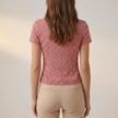 Back view of a FJØRNA women’s summer gingham V-neck blouse, lightweight top with short sleeves and classic checkered pattern.