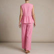 FJØRNA women's summer two-piece co-ord set with wide-leg pants and V-neck top, shown from the back in soft fabric.