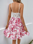 FJØRNA sleeveless white sundress with cutout details and a flared hem, shown from the back with lace floral fabric.
