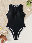 Women's FJØRNA sporty high neck zip swimsuit, elegant swimwear with a high neckline and zipper detail, suitable for active beach days.