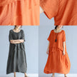 Gray linen cotton maxi dress by FJØRNA featuring a baggy, layered design with short sleeves, perfect for casual or wedding wear.