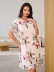 Elegant white dress by FJØRNA featuring flowing chiffon fabric and a stylish design, perfect for sophisticated occasions.