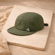 Men's FJØRNA hat featuring a classic cap design with a curved brim and adjustable strap for a stylish, comfortable fit.