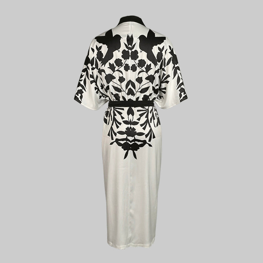 FJØRNA white midi dress with half sleeves, floral print, V-neck, and tied waist, perfect for casual or summer wear