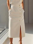 FJØRNA high waisted split-front maxi dress with elegant design, featuring a flowing fabric and stylish split front detail.