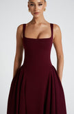 FJØRNA Betty Midi Dress in cherry lacquer finish, white midi length dress with sleek, elegant design and fitted silhouette.