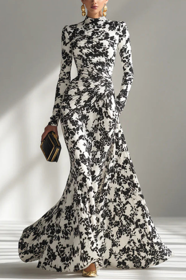 Black and white color-blocked printed long-sleeve maxi dress by FJØRNA with pleated skirt and front pockets in a slim-fit design.