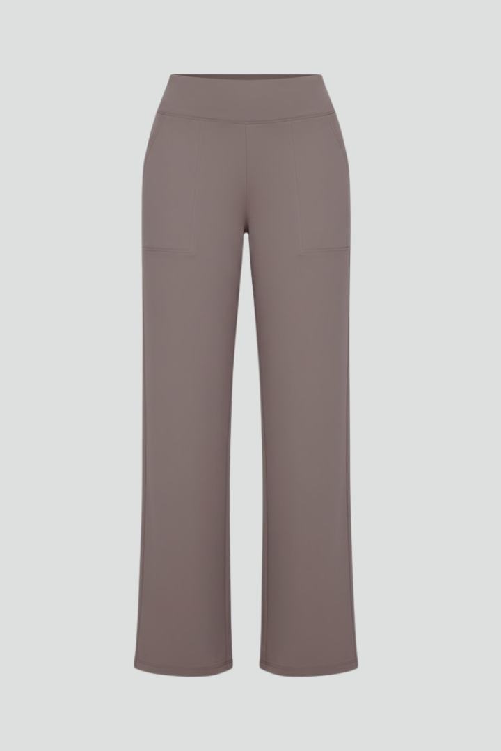 FJØRNA Bianca women's high-rise wide-leg trousers, stylish pants with a relaxed fit and modern silhouette, shown in the image.