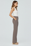 FJØRNA Bianca women's high-rise wide-leg trousers shown in a stylish fit, with a focus on the high waistband and relaxed leg silhouette.