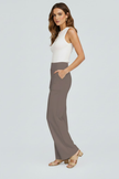 FJØRNA Bianca women's high rise wide leg trousers shown in beige fabric, styled with a relaxed fit and tailored waist.