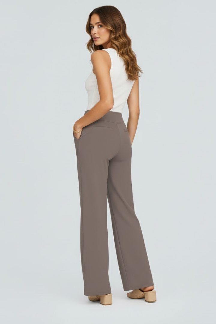 FJØRNA Bianca women's high-rise wide-leg trousers, stylish pants with a relaxed fit, shown in a neutral color.