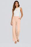 FJØRNA Bianca women's high-rise wide-leg trousers, stylish and comfortable pants with a flattering fit, shown on a model.