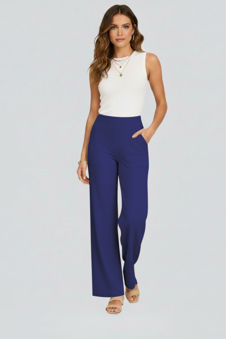 FJØRNA Bianca women's high-rise wide-leg trousers shown in black, featuring a relaxed fit and ankle-length style.