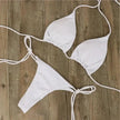 Women's golden shimmer bikini by FJØRNA, stylish swimwear for pool and beach with a flattering fit and elegant design.
