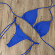 Women's golden shimmer bikini for pool and beach by FJØRNA, featuring a stylish, fitted swimwear design with a shimmering finish.