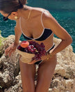 FJØRNA women's summer beach bikini set with colorful top and bottom, perfect for swimming and sunbathing on the beach.