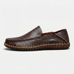 Men's FJØRNA handstitched PU leather slip-on loafers with round toe, suitable for smart casual wear, shown in natural brown leather.