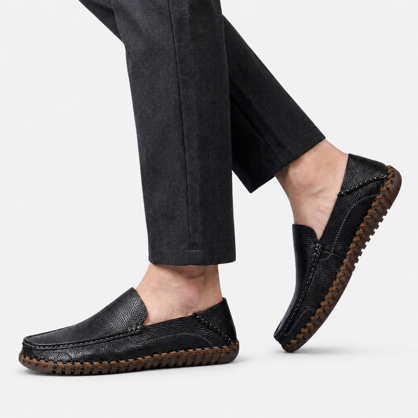 Men's FJØRNA handstitched PU leather slip-on loafers with round toe, shown in a smart casual style with a sleek finish.