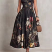 FJØRNA black floral Mao neck midi dress with keyhole detail, showcasing the elegant floral pattern and tailored fit.