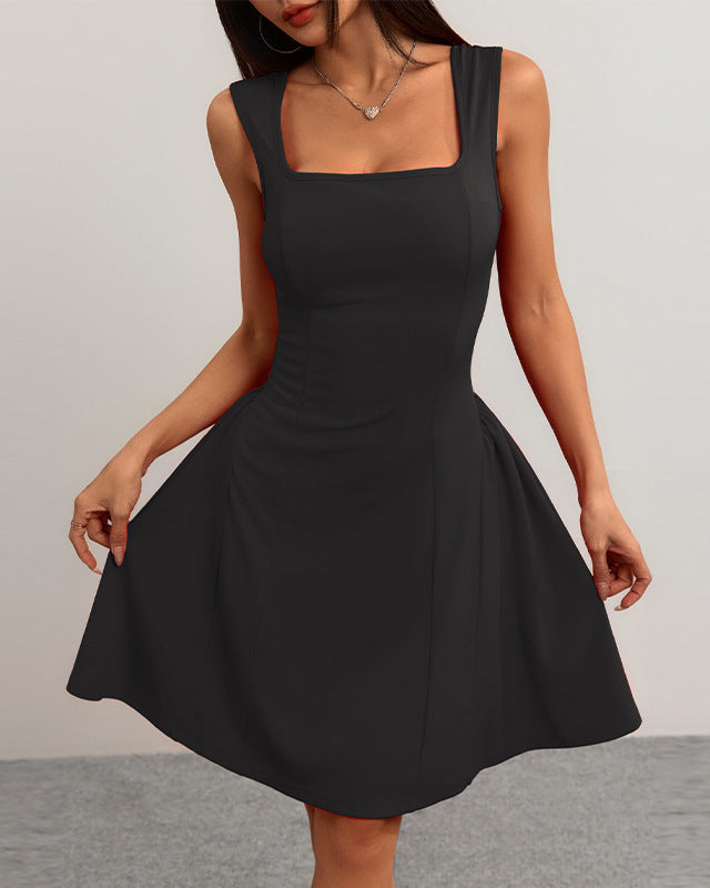FJØRNA black flared fit mini dress with square neckline, perfect for summer, featuring a stylish tailored design.