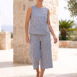 Black women's summer two-piece co-ord set with striped pattern and pocket details by FJØRNA, casual and stylish for warm weather.