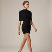 Black Puff Sleeve Bodycon Mini Dress with High Neck by FJØRNA, fitted dress featuring puff sleeves and a sleek silhouette.