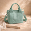 FJØRNA canvas tote bag for women with sturdy handles, stylish design, perfect for everyday use and carrying essentials.