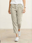 FJØRNA linen summer trousers for women with a relaxed straight-leg fit and drawstring waist, breathable and breezy for warm weather.