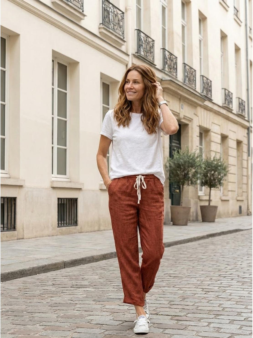 FJØRNA linen summer trousers for women with a relaxed straight-leg fit and drawstring waist, breathable and comfortable.