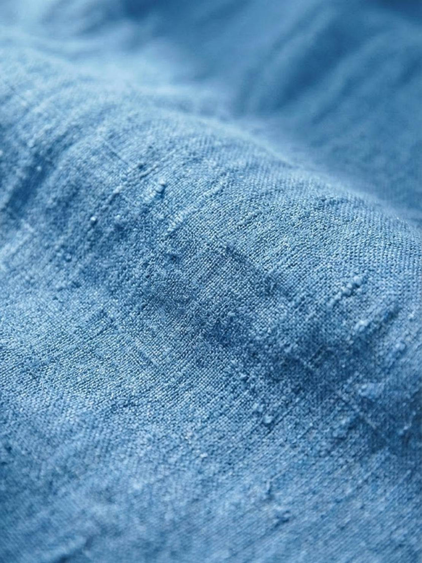 FJØRNA linen summer trousers for women with straight leg fit, drawstring waist, breathable and relaxed for warm weather.