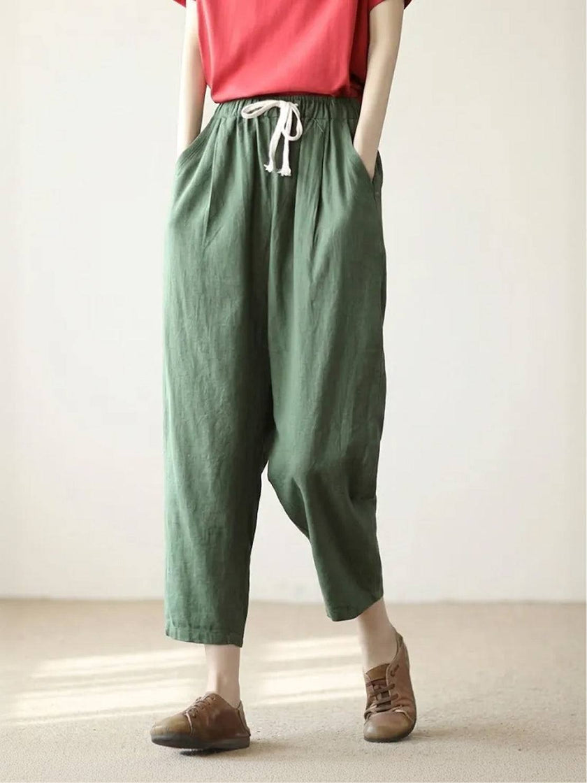 FJØRNA linen summer trousers for women with straight-leg fit and drawstring waist, breathable and breezy for warm weather.