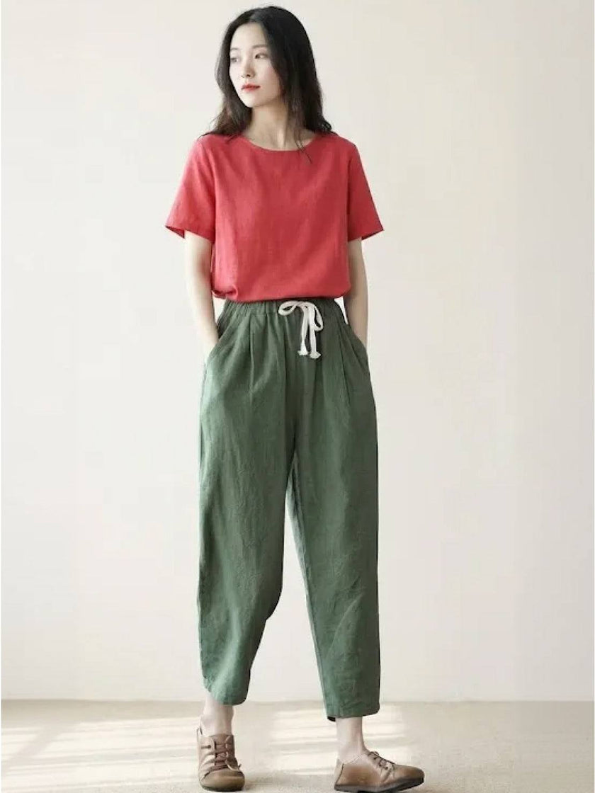 FJØRNA linen summer trousers for women with a relaxed straight-leg fit, drawstring waist, breathable and lightweight fabric.