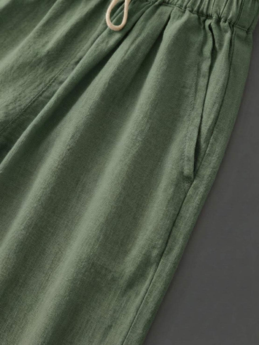 FJØRNA linen summer trousers for women with straight leg fit, drawstring waist, breathable and breezy for warm weather.