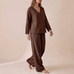 Brown FJØRNA women's two-piece co-ord set with pockets and V-neck, featuring a stylish and comfortable design.
