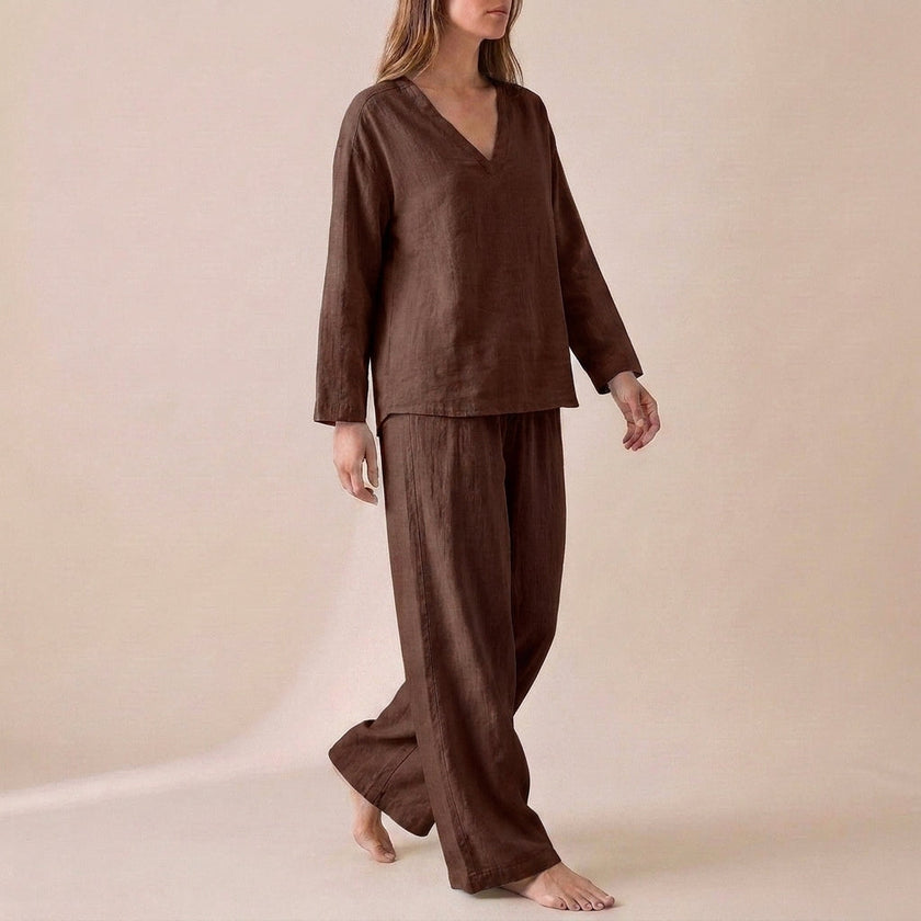 Brown FJØRNA women's two-piece co-ord set with pockets and V-neck, featuring a stylish and comfortable design.