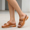 Brown FJØRNA orthopedic buckle platform slide sandals for women with wide straps and cushioned soles.
