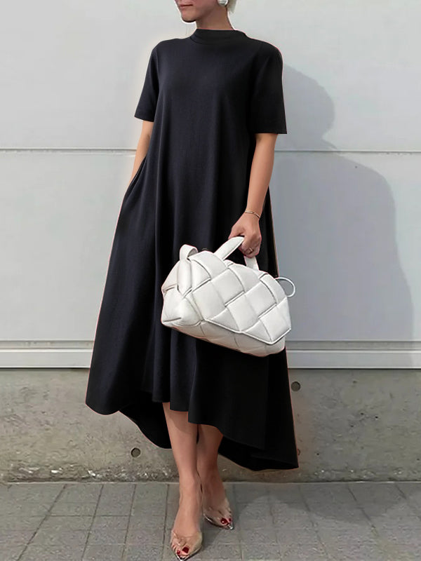 FJØRNA high-low white maxi dress with short sleeves and solid color, flowing and elegant for casual or formal wear.