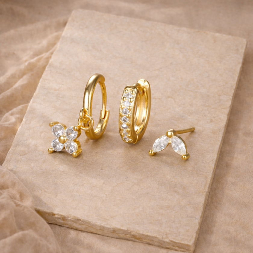 Unisex piercing set from FJØRNA featuring various jewelry accessories for women, displayed on a white background.