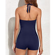 Women's FJØRNA shaping halter swimsuit with pleated fit, featuring stylish design and supportive fit for swimwear elegance.