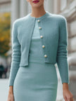 FJØRNA classic cropped knit cardigan and midi dress set, featuring a cozy knit cardigan paired with a stylish midi dress.