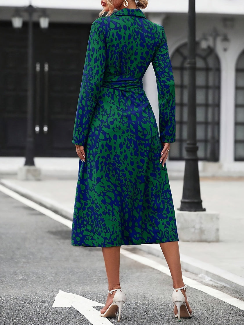White FJØRNA elegant shirt dress with a classic collar and button-down front, styled for a sophisticated look.